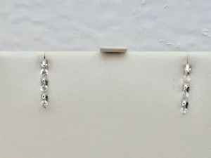 14 K White Gold Dangle Diamond Earrings 0.27 Carats.
