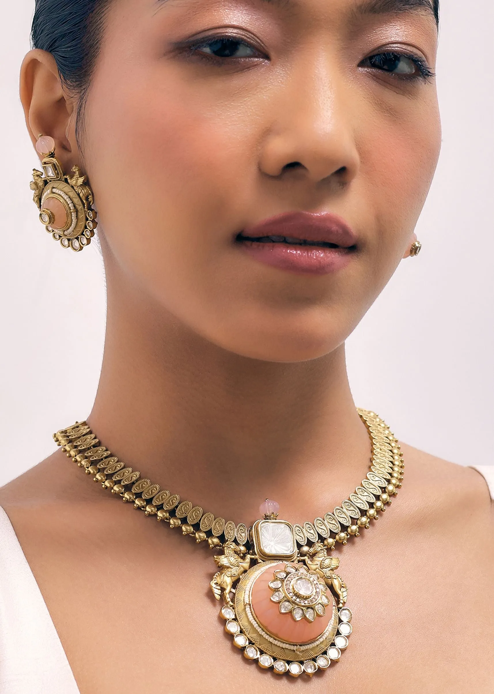 Peach Gold Finish Necklace Set With Carving Work